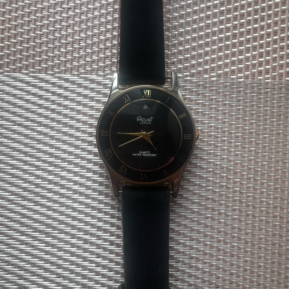 Accutime Black and Gold Watch
